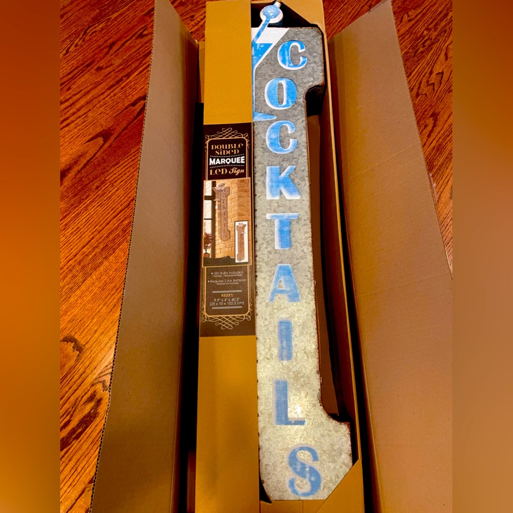 “Cocktail” sign with LED lights